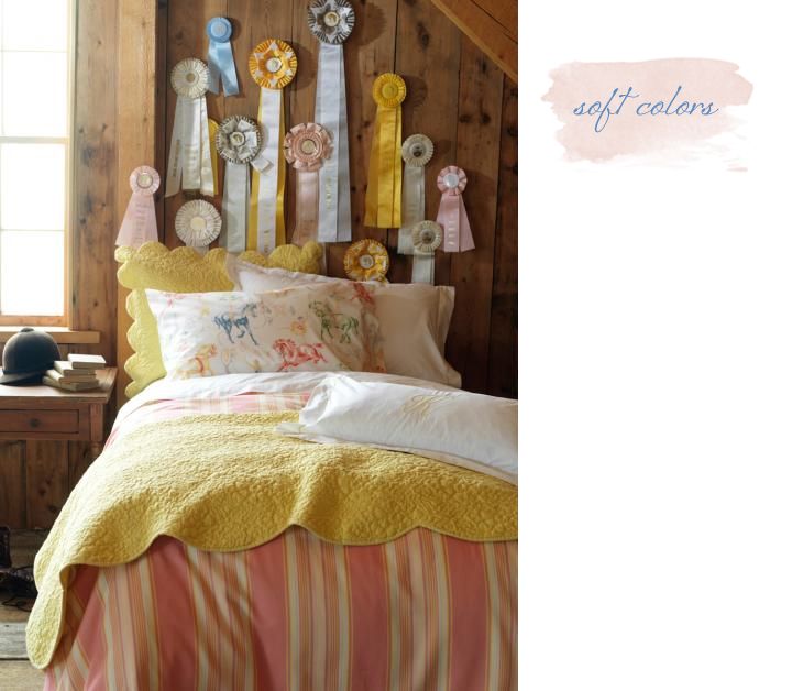 I really like the feminine take on equestrian style, especially the display of ribbons. Sweet little girl's room.