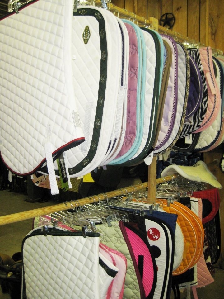 clever way to organize and store english saddle pads