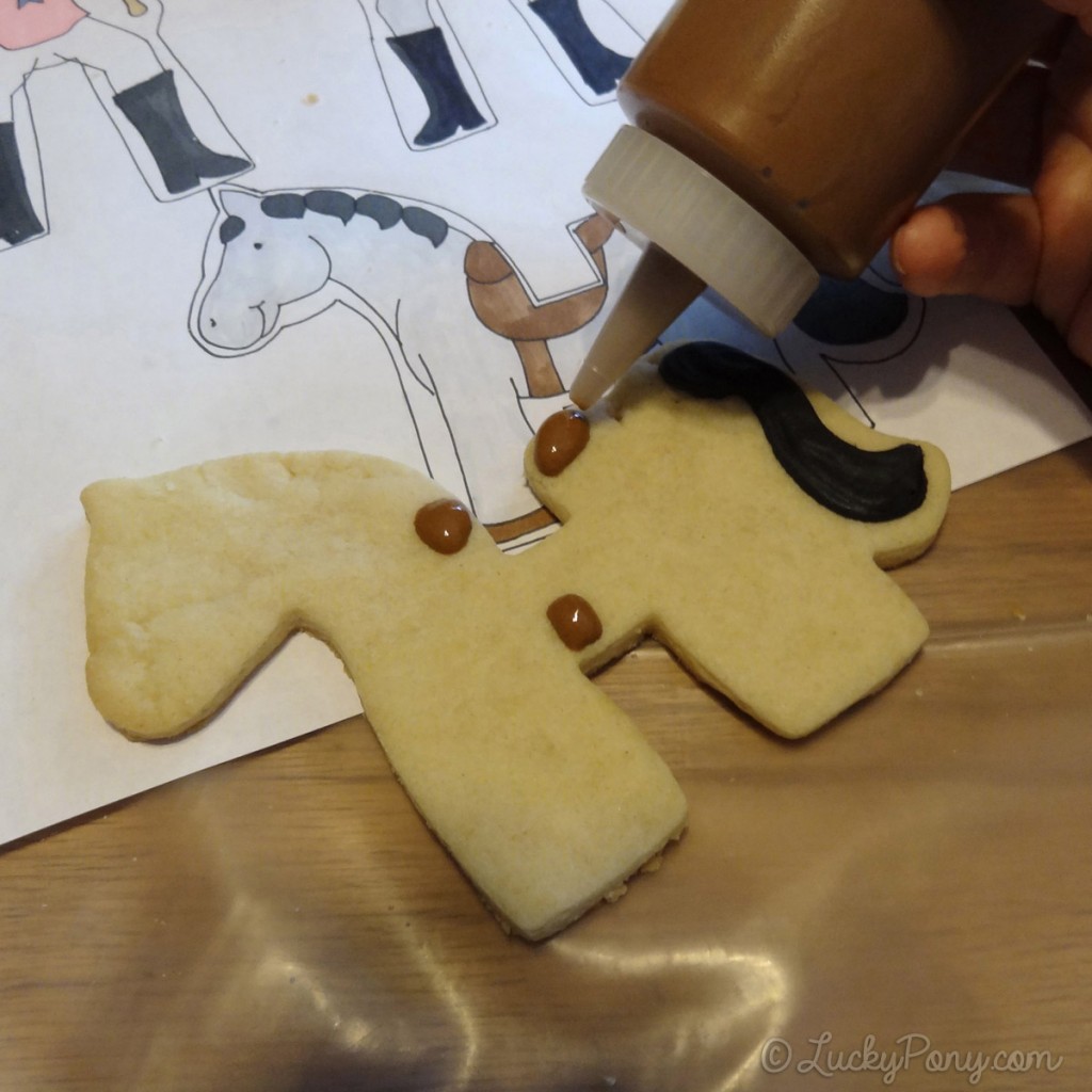 decorating a horse cookie