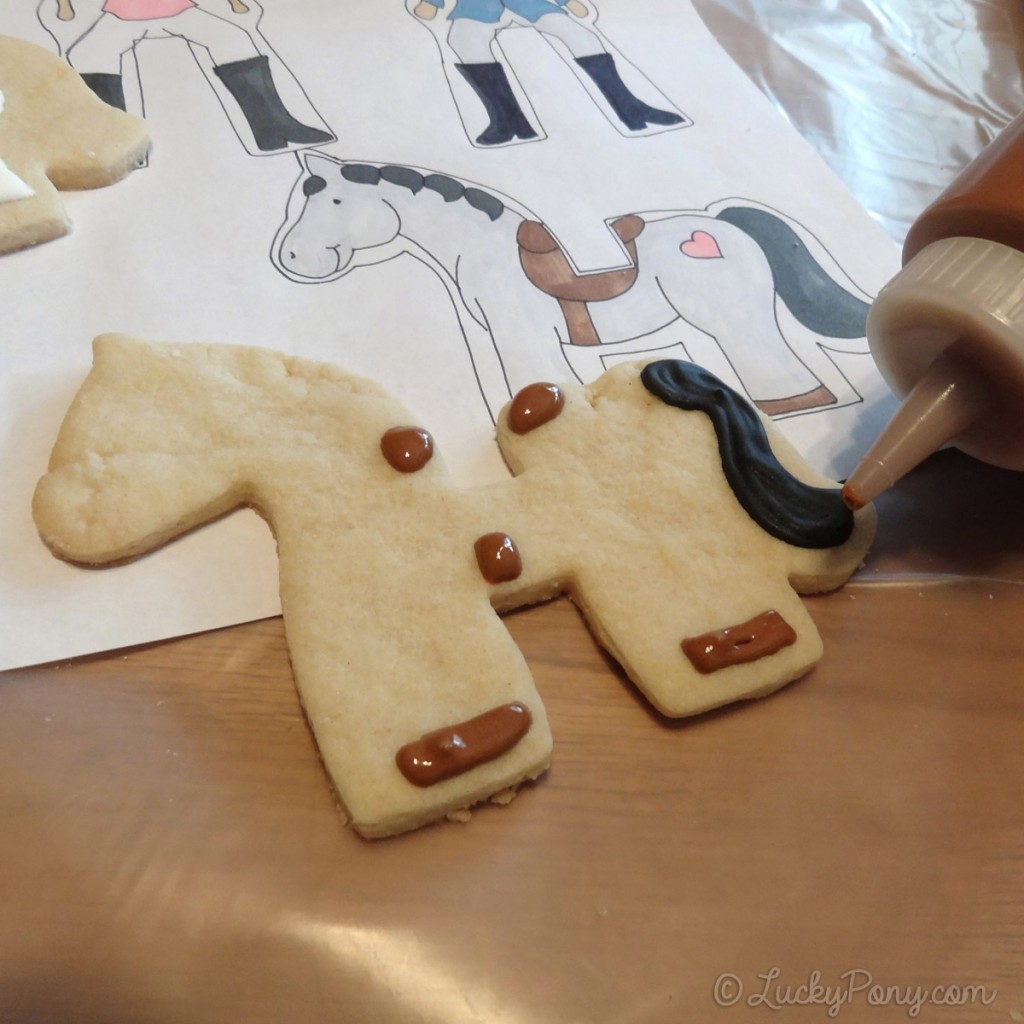 decorating a horse cookie