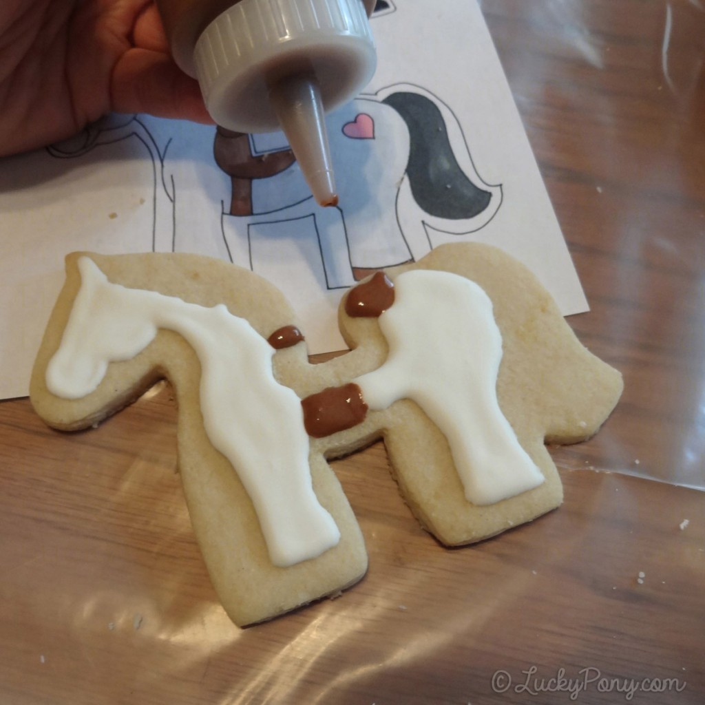 decorating a horse cookie